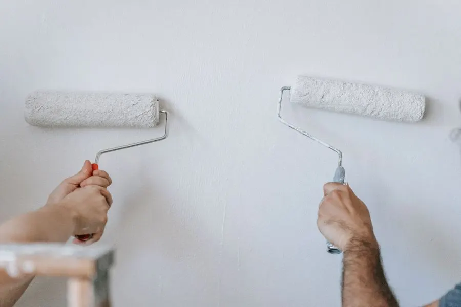 Interior wall being painted with a roller